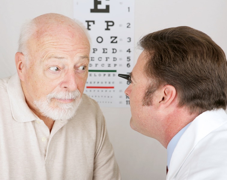 Older man having eye test