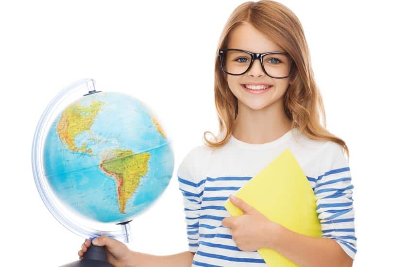 Female student wearing glasses holding a globe, promoting eye health and vision care.