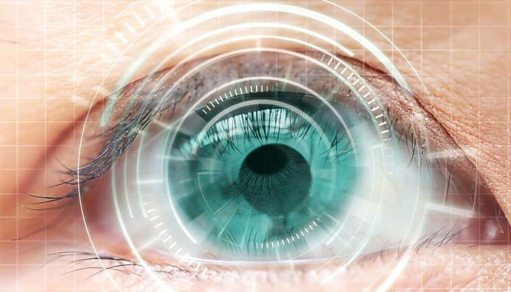 Close-up of a human eye with digital interface for eye health assessment.