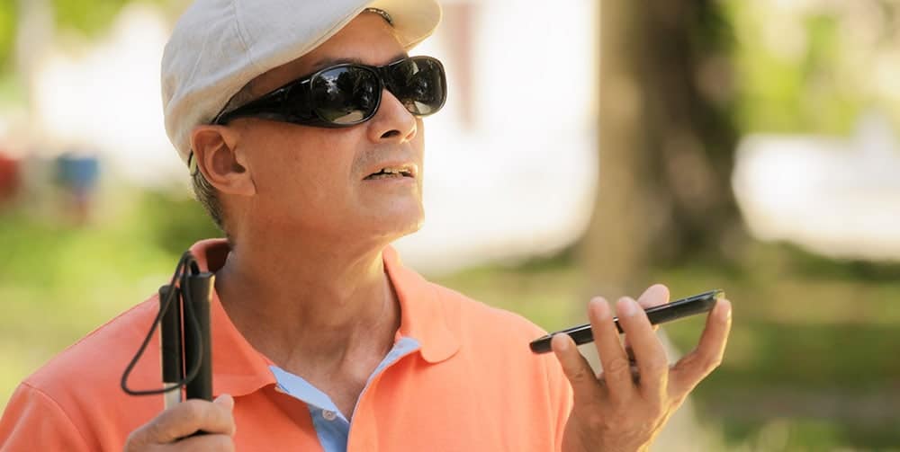 Blind man using cell phone