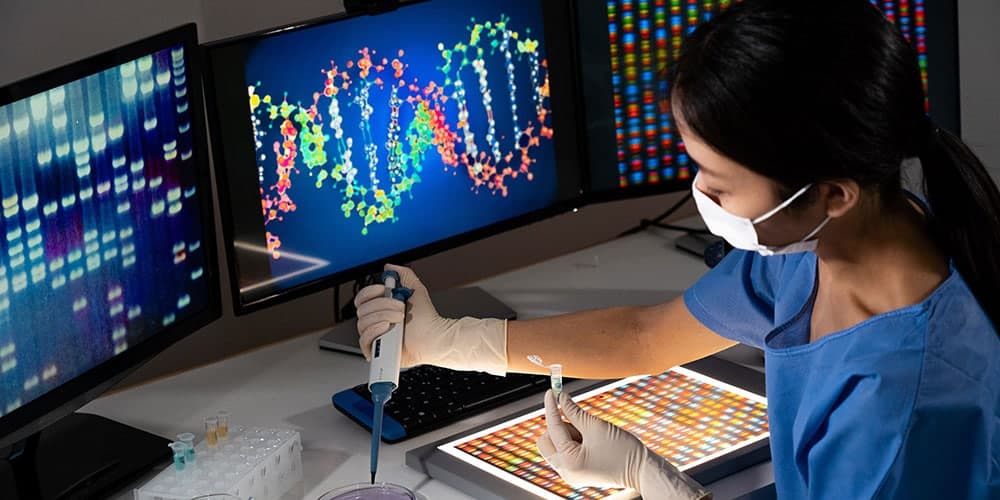 Female doctor examining gene for gene therapy use