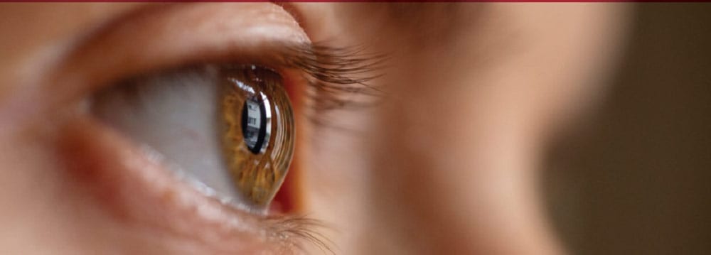 Close-up of a human eye at Assil Gaur Eye Institute for advanced vision care.