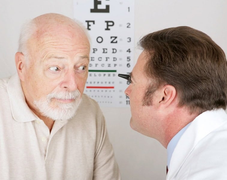 Older man having eye test