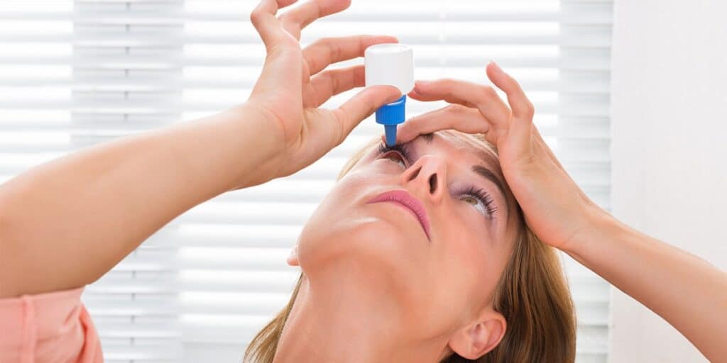 Close-up of an eye exam with eye drops at Assil Gaur Eye Institute.