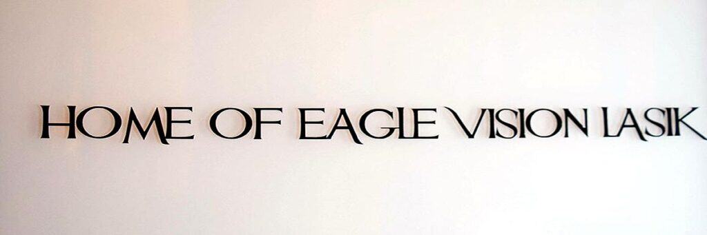 Sign reading "Home of Eagle Vision LASIK" at Assil Gaur Eye Institute.