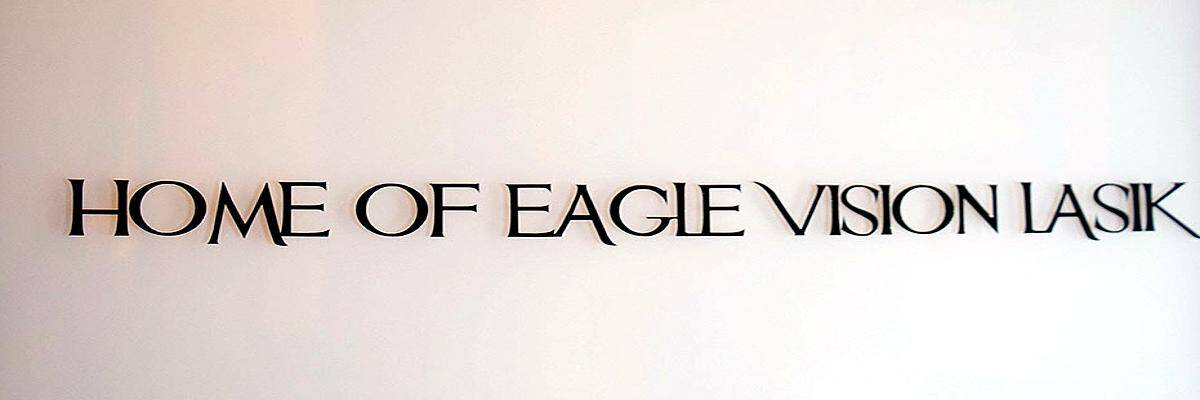 Sign reading "Home of Eagle Vision LASIK" at Assil Gaur Eye Institute.